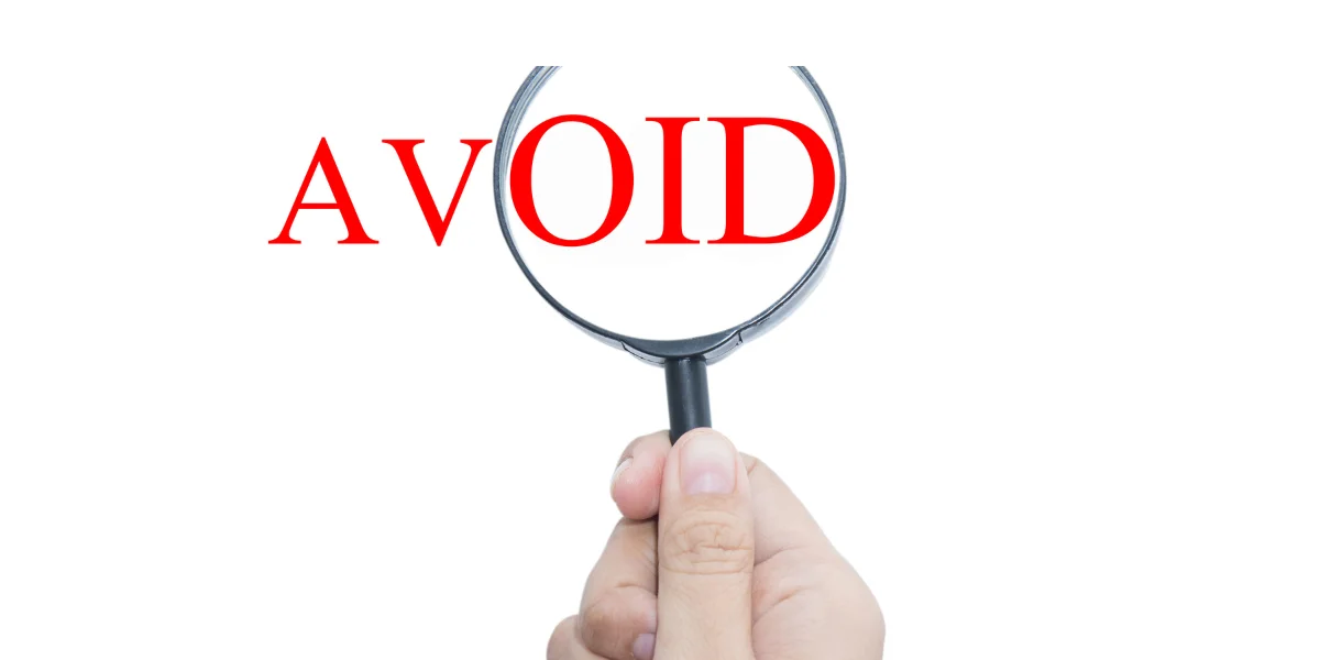 predatory lenders to avoid highlighted with magnifying glass and warning message